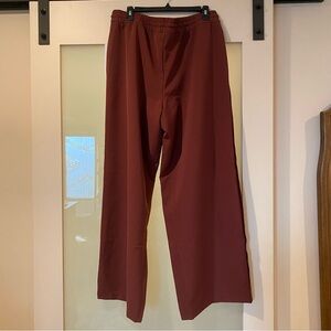 Atleta women’s Brick Red Joggers with sewn in seams. Size Large